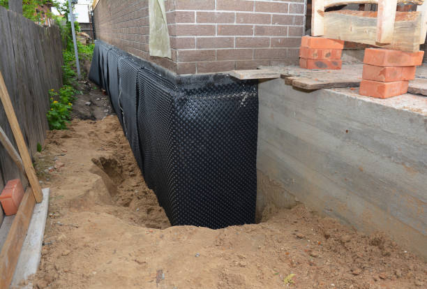 SJ Waterproofing Pros technician performing targeted Crawl Space Encapsulation assessment in Carlstadt, NJ